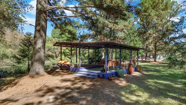 view of property's community featuring a wooden deck and a lawn