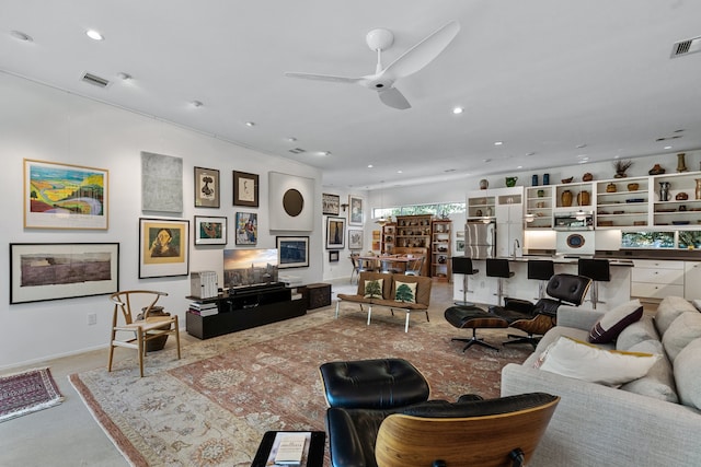 living room with ceiling fan