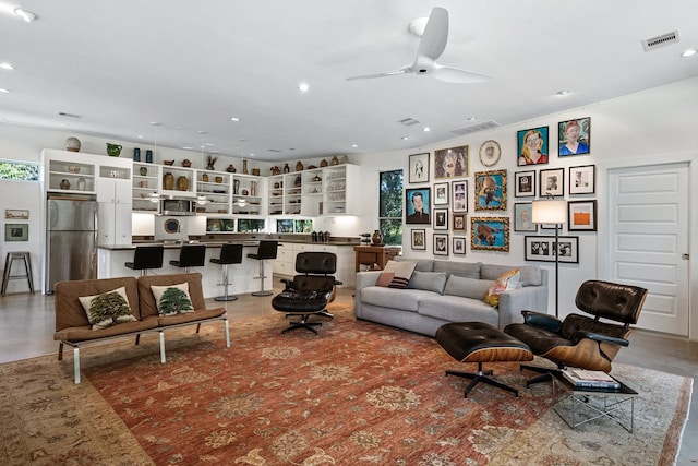 living room with ceiling fan