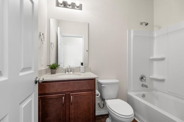 full bathroom featuring toilet, vanity, and shower / bathtub combination