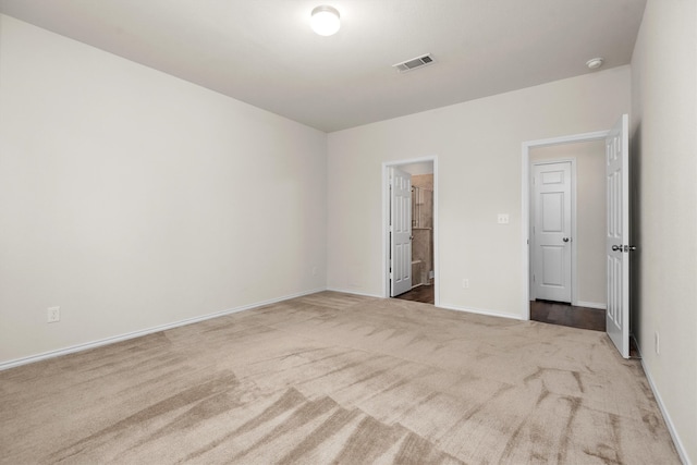 unfurnished room featuring carpet floors