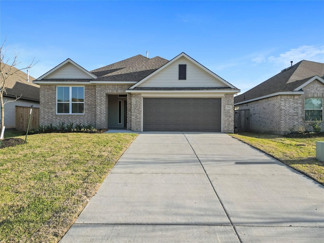 view of front facade featuring brick siding, a garage, concrete driveway, and a front lawn