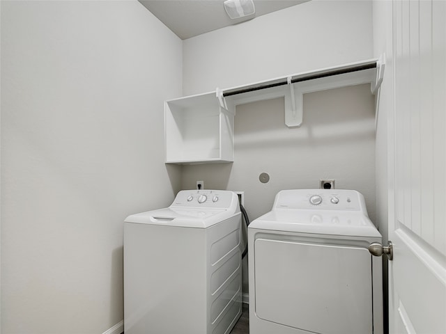 washroom featuring washer and dryer