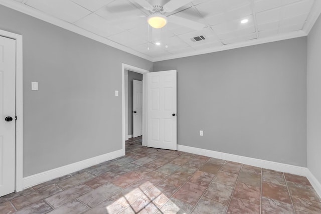 empty room with ceiling fan and ornamental molding