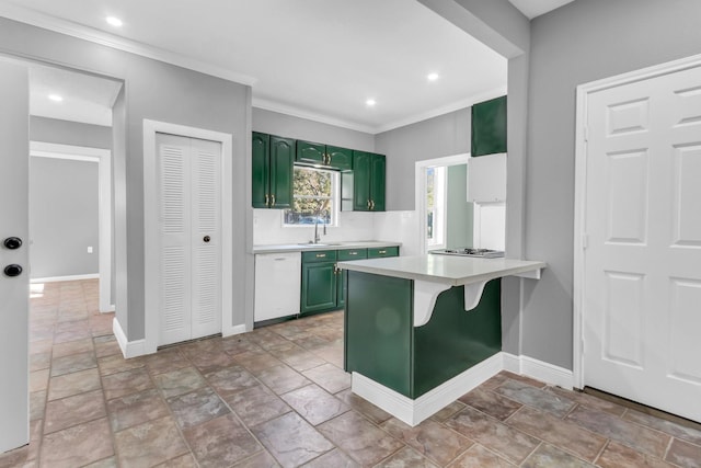 kitchen featuring dishwasher, sink, green cabinets, kitchen peninsula, and crown molding