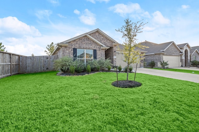 view of front of house featuring a garage and a front lawn