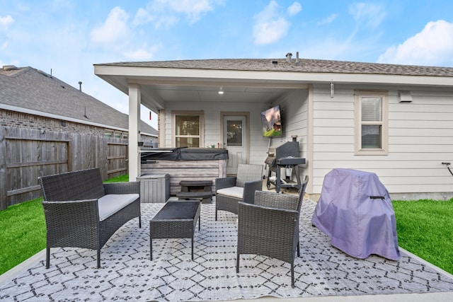 view of patio featuring a hot tub