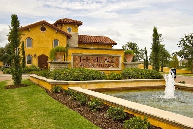 view of community sign