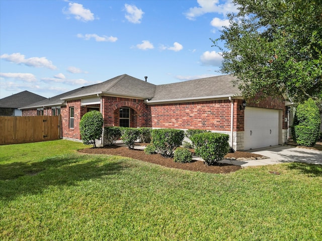 single story home featuring a garage and a front lawn