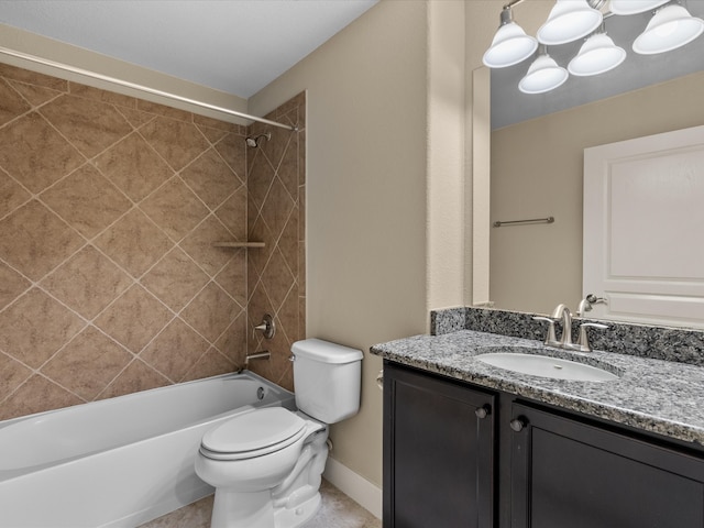 full bathroom with vanity, toilet, and tiled shower / bath combo