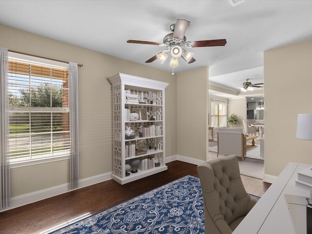 office area with dark hardwood / wood-style floors and ceiling fan