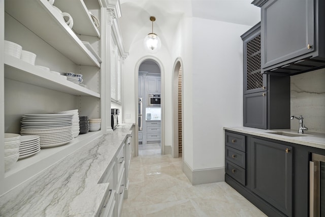 bathroom featuring beverage cooler and vanity