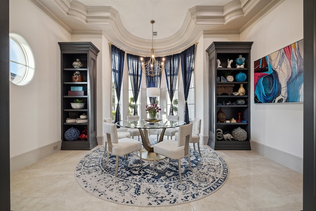 dining space featuring a chandelier and crown molding