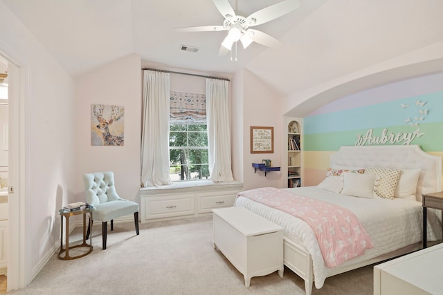 carpeted bedroom featuring lofted ceiling and ceiling fan