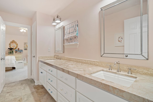 bathroom featuring vanity and ceiling fan