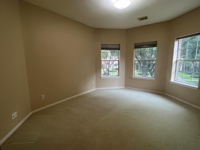 unfurnished room with carpet