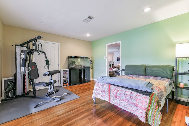 bedroom featuring hardwood / wood-style floors