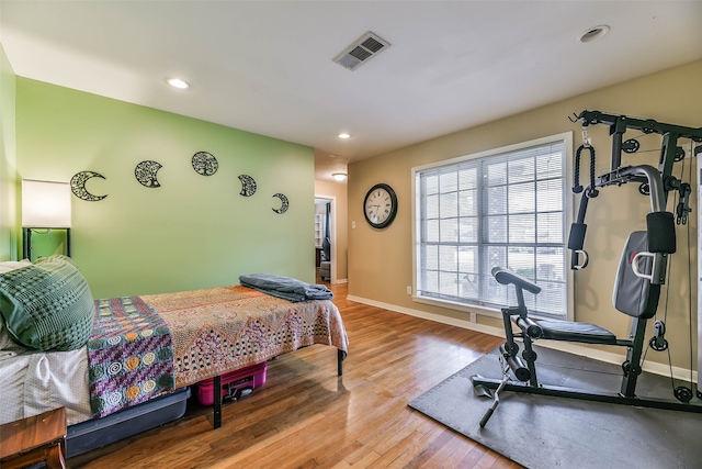 bedroom with wood-type flooring