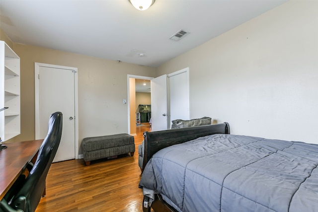 bedroom featuring hardwood / wood-style floors