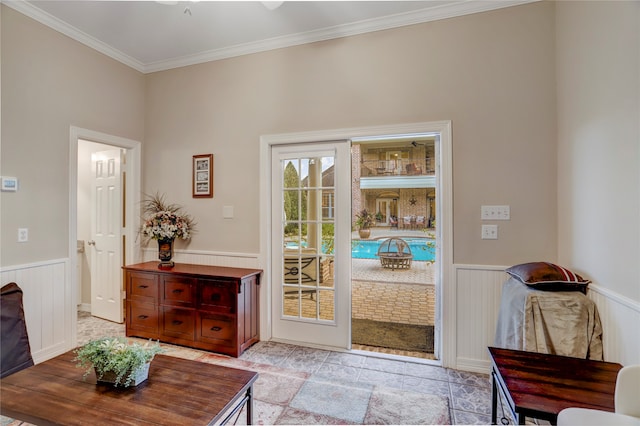 doorway to outside with crown molding