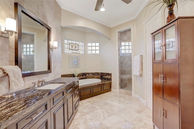 bathroom with shower with separate bathtub, vanity, ceiling fan, and crown molding