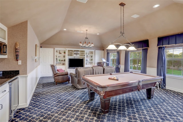 game room featuring built in features, pool table, vaulted ceiling, and dark colored carpet