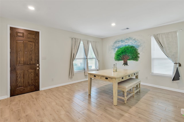 dining area with light hardwood / wood-style flooring