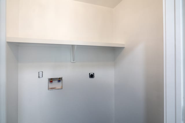 laundry room with hookup for a washing machine and hookup for an electric dryer