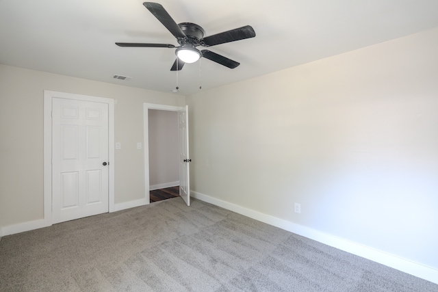 unfurnished bedroom with carpet and ceiling fan