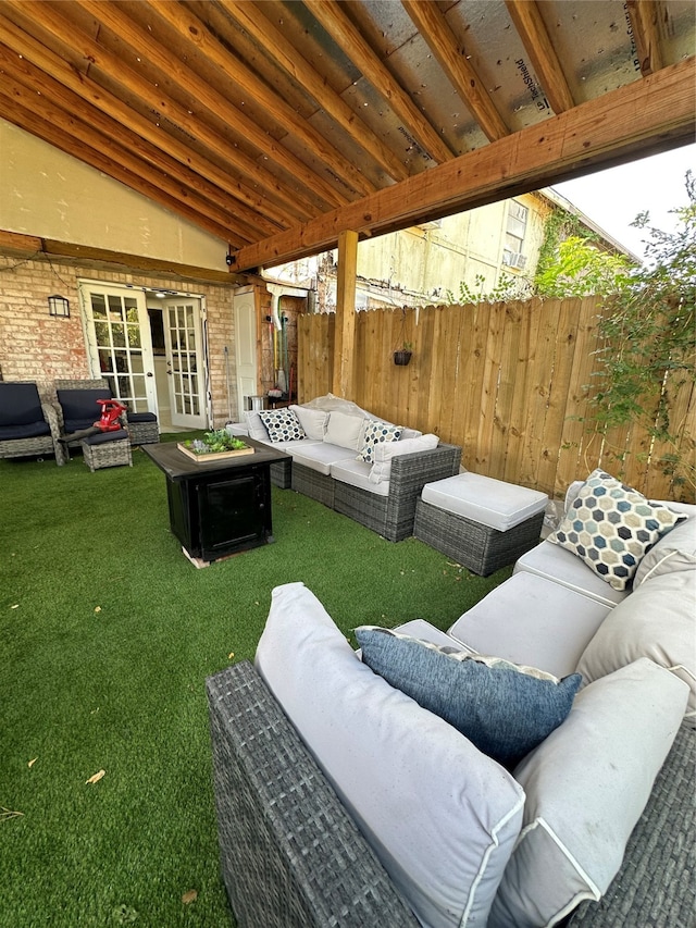 view of patio / terrace featuring french doors and an outdoor living space