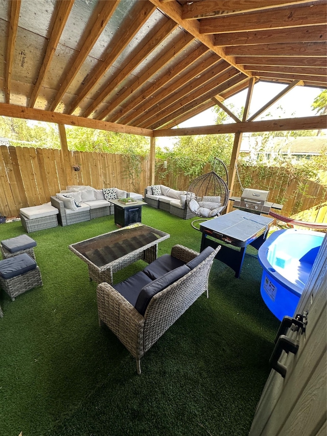 view of patio / terrace with an outdoor hangout area and grilling area