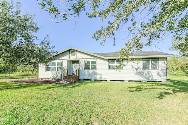 view of front of home with a front lawn