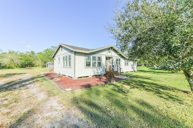 exterior space featuring a lawn