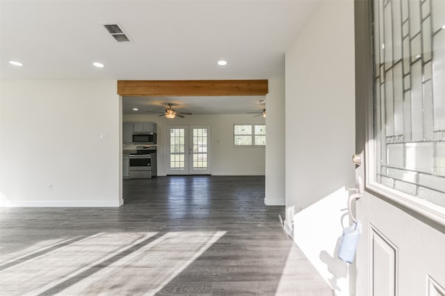 entrance foyer featuring french doors, ceiling fan, and dark hardwood / wood-style flooring