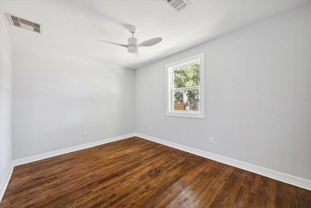 empty room with hardwood / wood-style floors and ceiling fan