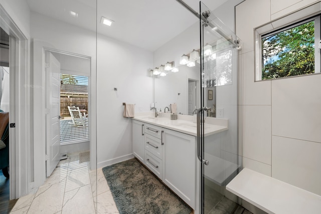 bathroom featuring vanity and walk in shower