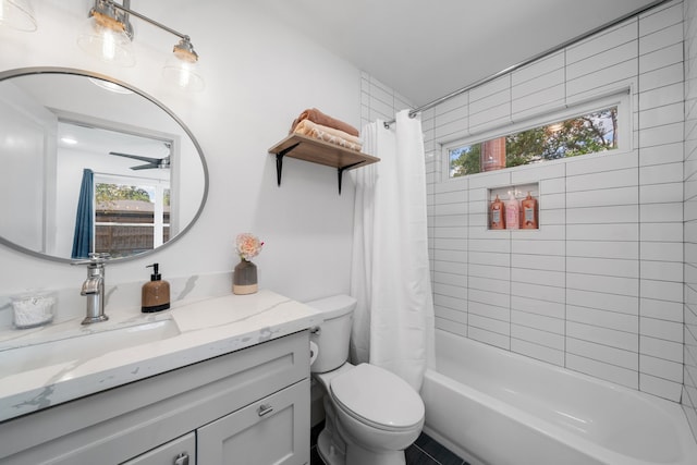 full bathroom with vanity, shower / tub combo, toilet, and ceiling fan