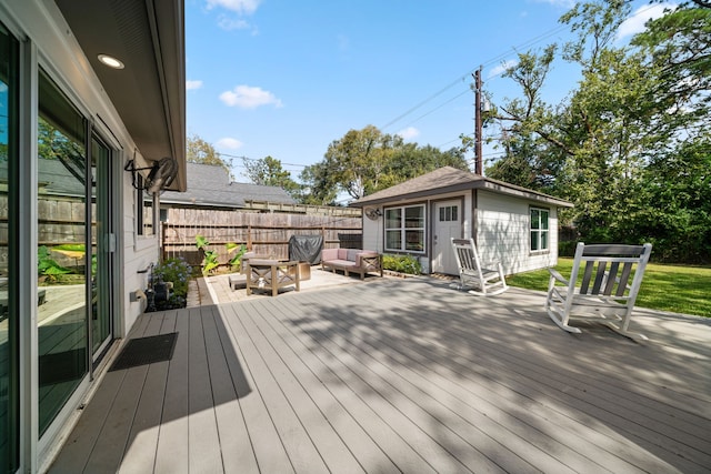 deck with an outdoor structure