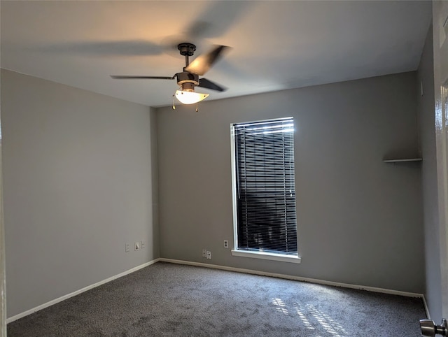 unfurnished room featuring carpet flooring and ceiling fan