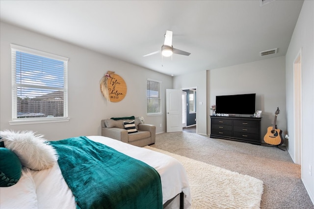 bedroom featuring carpet flooring and ceiling fan