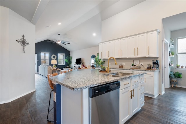 kitchen with dark hardwood / wood-style flooring, lofted ceiling, dishwasher, a kitchen island with sink, and white cabinetry