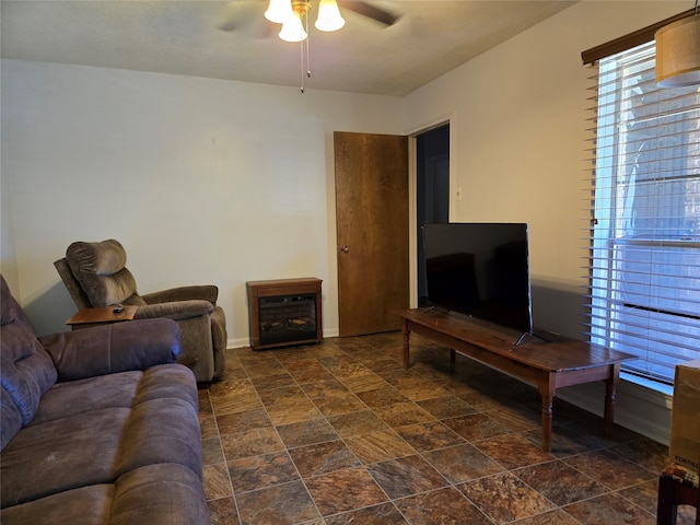 living room featuring ceiling fan