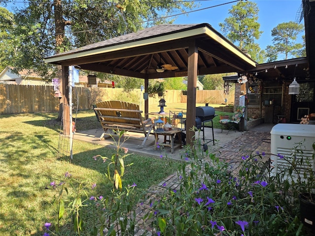 view of yard featuring a gazebo, an outdoor living space, and a patio