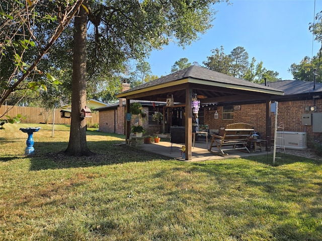 view of yard with a patio and a gazebo