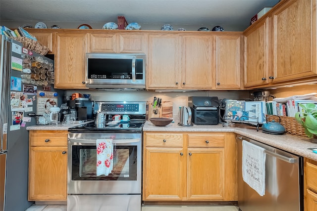 kitchen with appliances with stainless steel finishes