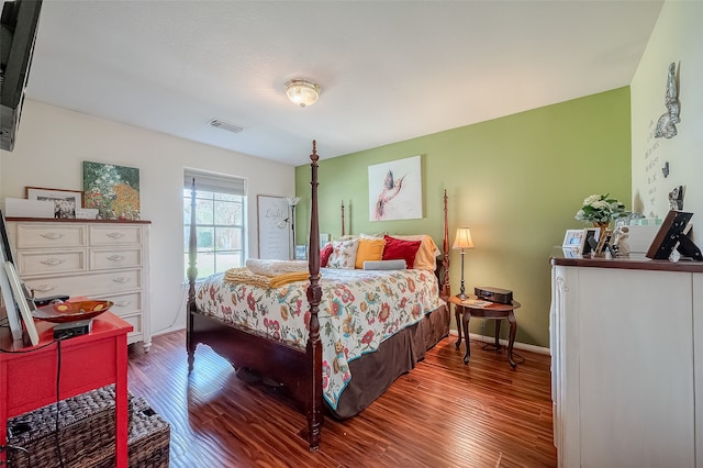 bedroom featuring hardwood / wood-style floors