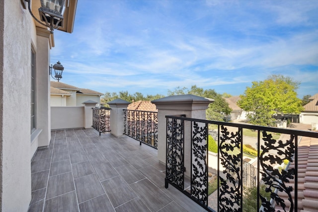 view of patio with a balcony