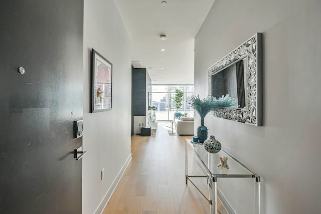 hallway featuring light wood-type flooring