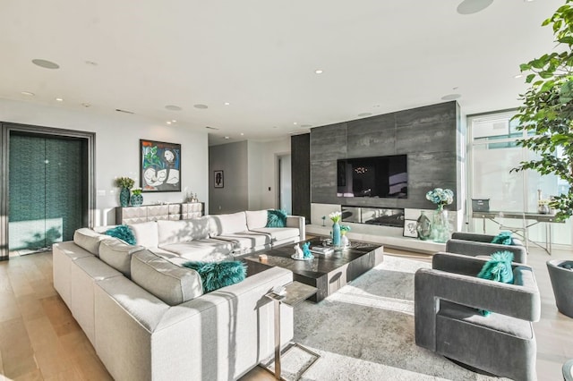 living room with light hardwood / wood-style floors