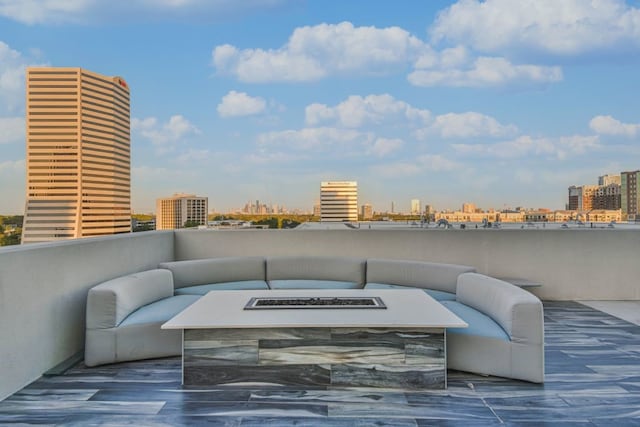 view of patio featuring an outdoor fire pit